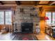 Elegant stone fireplace serves as a focal point in this inviting living space at 7037 Indian Lake W Blvd, Indianapolis, IN 46236