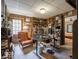 Traditional style office with wood paneling, built-in bookshelves, and a classic leather chair at 7037 Indian Lake W Blvd, Indianapolis, IN 46236