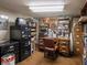 Vintage office with cozy furnishings and a dark wood desk at 7037 Indian Lake W Blvd, Indianapolis, IN 46236