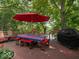 A picturesque outdoor deck offers a delightful space for dining and relaxation at 7037 Indian Lake W Blvd, Indianapolis, IN 46236