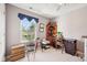 Cozy bedroom with natural light, a desk, and a ceiling fan at 715 Stockbridge Dr, Westfield, IN 46074