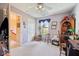 Cozy bedroom with carpet floors, a window, and a ceiling fan at 715 Stockbridge Dr, Westfield, IN 46074