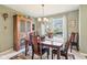 Elegant dining room featuring a classic wood table, chairs, and ample space for gatherings at 715 Stockbridge Dr, Westfield, IN 46074