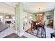 Open-concept dining room adjacent to living room and kitchen at 715 Stockbridge Dr, Westfield, IN 46074