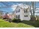 Attractive two-story home boasting a well-kept lawn, mature trees, and an American flag at 715 Stockbridge Dr, Westfield, IN 46074