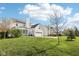 Charming home with a well-manicured lawn, screened in porch and attached garage on a sunny day at 715 Stockbridge Dr, Westfield, IN 46074