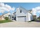 Attractive home showcasing a screened in porch and attached garage, perfect for modern living at 715 Stockbridge Dr, Westfield, IN 46074