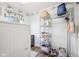 Functional laundry room with a washing machine, shelving, and storage racks at 715 Stockbridge Dr, Westfield, IN 46074