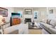 Cozy living room with fireplace, neutral decor, and comfortable seating arrangement at 715 Stockbridge Dr, Westfield, IN 46074