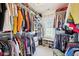 Walk-in closet with custom shelving and organized clothing racks at 715 Stockbridge Dr, Westfield, IN 46074