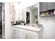 Elegant bathroom with a double sink vanity, quartz countertop, and gold hardware, providing ample space and style at 7239 Governors Row, Avon, IN 46123
