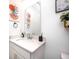 Well-lit bathroom features a sleek vanity with quartz countertop and contemporary decor at 7239 Governors Row, Avon, IN 46123