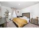 Inviting bedroom with neutral decor, a plush bed, stylish furniture, and soft natural light at 7239 Governors Row, Avon, IN 46123