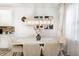 Cozy dining area showcasing modern lighting, a marble table with seating for six, and stylish wall decor at 7239 Governors Row, Avon, IN 46123