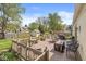 Spacious wooden deck with outdoor seating and dining area offering perfect spot for relaxation and entertainment at 768 Grace Ct, Carmel, IN 46032