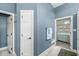 Hallway featuring an ensuite bathroom, closet, and entry into the bedroom at 768 Grace Ct, Carmel, IN 46032