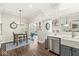 Transitional kitchen space with a view to a breakfast nook and dishwasher at 768 Grace Ct, Carmel, IN 46032