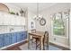 Cozy eat-in kitchen featuring a wooden table with seating and a view of the backyard at 768 Grace Ct, Carmel, IN 46032
