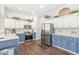 Well-lit kitchen featuring white cabinets, stainless steel appliances, and stylish subway tile backsplash at 768 Grace Ct, Carmel, IN 46032