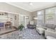 Inviting living room with comfortable seating and a view into the adjacent kitchen area at 768 Grace Ct, Carmel, IN 46032