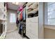 Organized walk-in closet featuring white shelving and plenty of storage space at 7756 N Audubon Rd, Indianapolis, IN 46250