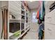 Organized walk-in closet with custom shelving, drawers, and ample storage space for clothing and accessories at 7756 N Audubon Rd, Indianapolis, IN 46250