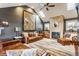 Spacious living room with vaulted ceilings, fireplace, and comfortable leather furnishings at 902 N College Ave, Indianapolis, IN 46202