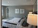 Spacious bedroom with a decorative bed, neutral walls and carpet at 990 Sunchaser Rd, Lebanon, IN 46052