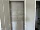 Linen closet showcasing multiple wire shelves, providing lots of storage next to the bathroom at 990 Sunchaser Rd, Lebanon, IN 46052