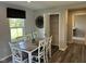Charming dining area features a large table, stylish chairs, and a pantry at 990 Sunchaser Rd, Lebanon, IN 46052