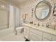 Full bathroom featuring floral wallpaper, tile floor, and standard tub at 107 Knoll Ct # F, Noblesville, IN 46062