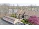 Exterior view showcasing a condo unit with well-kept parking and landscaping at 107 Knoll Ct # F, Noblesville, IN 46062