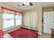 Serene bedroom with ceiling fan and bright natural light; a peaceful and inviting space for relaxation at 10820 Washington Bay Dr, Fishers, IN 46037