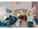 Inviting living area with plush sofas, hardwood floors, seamlessly connects to the kitchen at 10820 Washington Bay Dr, Fishers, IN 46037