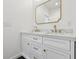 Elegant bathroom featuring double sinks, stylish fixtures, and vanity storage at 1158 Burdsal Pkwy, Indianapolis, IN 46208