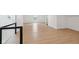 Bright bonus room has recessed lights, wood floors, and a modern railing at 1158 Burdsal Pkwy, Indianapolis, IN 46208