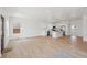 Bright living room and kitchen area with stainless appliances and ample natural light at 1158 Burdsal Pkwy, Indianapolis, IN 46208