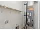 Utility room featuring storage shelves, utility sink hookups, and newer furnace at 1158 Burdsal Pkwy, Indianapolis, IN 46208