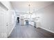 A bright, freshly-painted kitchen with stainless steel appliances and sleek cabinets, perfect for culinary endeavors at 117 W Arizona St, Indianapolis, IN 46225