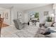 Cozy living room featuring modern furniture, a mounted TV, and neutral decor at 12821 Gloria Dr, Fishers, IN 46037