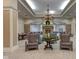 Beautifully decorated lobby with chandelier, fireplace and comfortable seating at 12821 Gloria Dr, Fishers, IN 46037