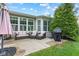 The backyard patio has outdoor seating and a grill, perfect for enjoying outdoor meals at 12821 Gloria Dr, Fishers, IN 46037