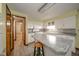 Updated kitchen featuring white cabinets, stainless appliances, and a stylish island at 1507 Lynnwood Dr, Anderson, IN 46012