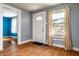 Bright living room with natural light and hardwood floors, showcasing a neutral color palette and spacious layout at 1510 Asbury St, Indianapolis, IN 46203