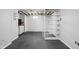 Versatile basement featuring pegboard storage and open shelving for organization, ready for customization at 157 E 61St St, Indianapolis, IN 46220