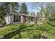 Attractive house with a cozy patio, perfect for enjoying the outdoors and entertaining guests at 157 E 61St St, Indianapolis, IN 46220