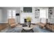 Cozy living room area with a fireplace, built-in shelving, and hardwood floors at 157 E 61St St, Indianapolis, IN 46220
