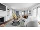 Comfortable living room showcasing a sofa, table and an archway into the breakfast nook at 157 E 61St St, Indianapolis, IN 46220