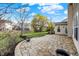 Spacious backyard with large stone patio and lush lawn at 16271 Ambia Cir, Westfield, IN 46074