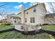 View of the home's exterior with patio and landscaped backyard at 16271 Ambia Cir, Westfield, IN 46074
